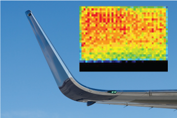 This image depicts an example pressure mapping reading from a composite molding application. In this test, there are clear areas of uneven pressure distribution, indicated by the red spots seen toward the upper-left portion of the testing area.