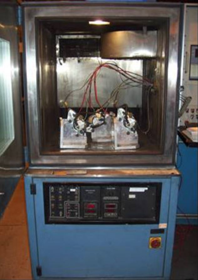 Figure 2: Testing fixtures placed within a temperature-controlled environmental chamber.
