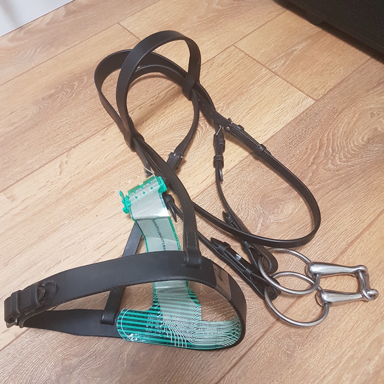 Figure 1: A paper-thin, trimmable F-Scan sensor proved to be a great method to measure pressure distribution of an equine noseband. Image provided courtesy of Biosense Medical Ltd.