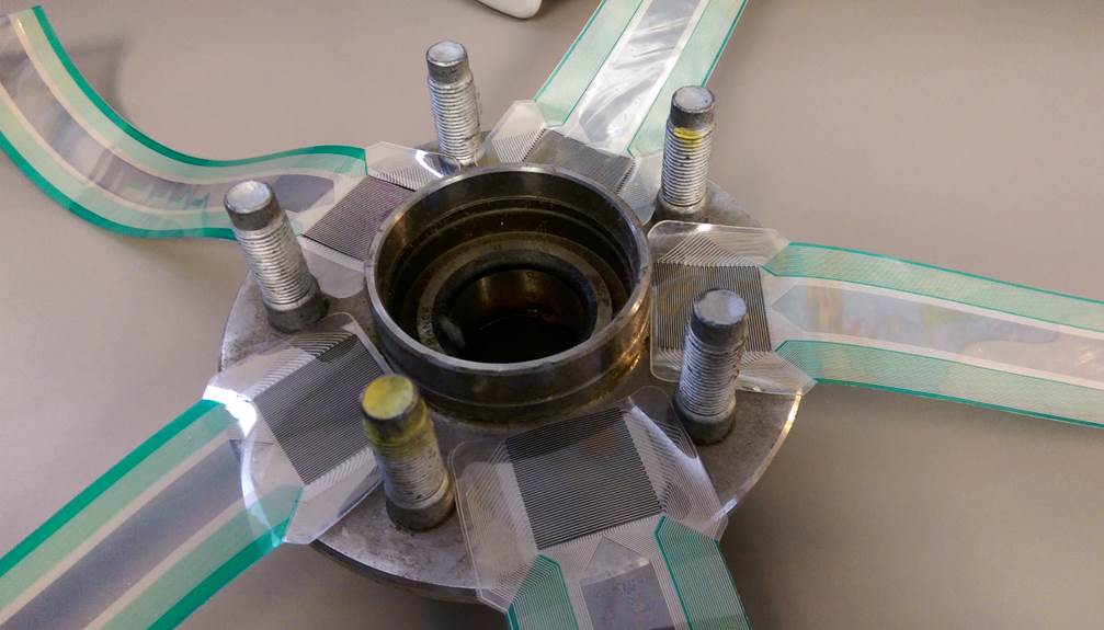 Figure 1: A conceptual method to position pressure mapping sensors around a wheel rim assembly.